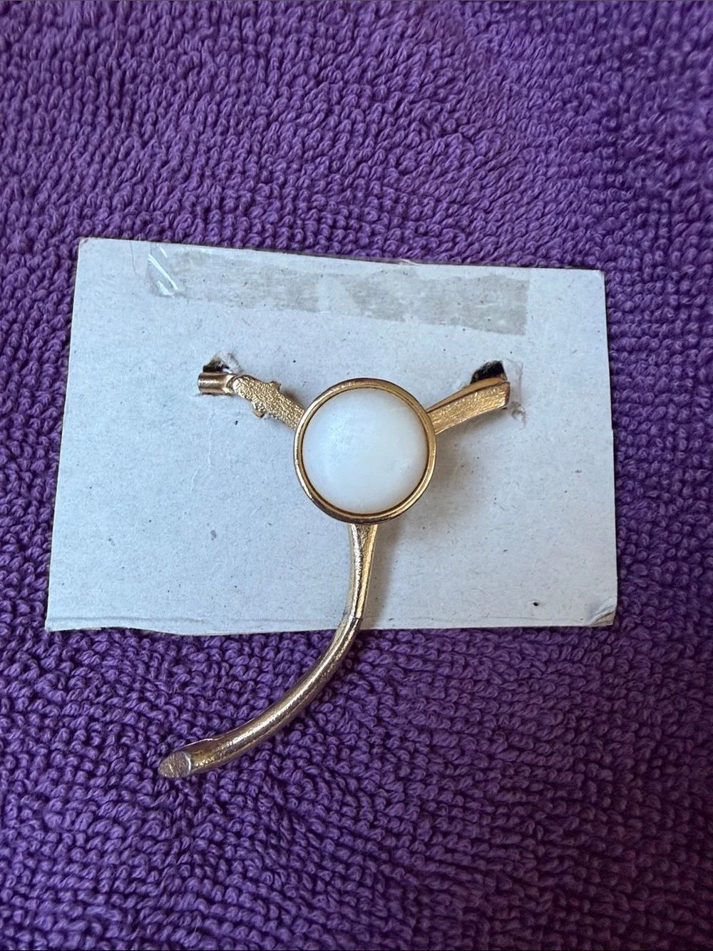 Levi's Gold-Tone Brooch with White Center
